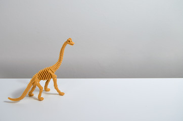 DIno toy on white background
