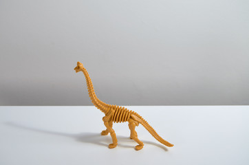 DIno toy on white background