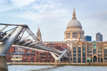 Fototapeta na wymiar St Pauls Cathedral and the Millennium Bridge on a winter day in London 