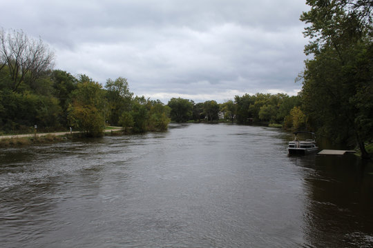 Fox River in southern Wisconsin with a boat on a pier