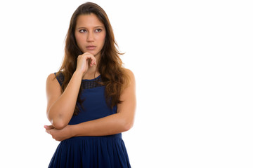 Portrait of young beautiful woman thinking and looking away