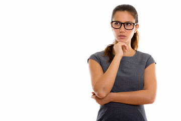 Portrait of young beautiful businesswoman with eyeglasses thinking