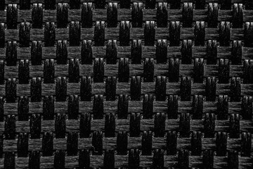 Weave texture background black macro