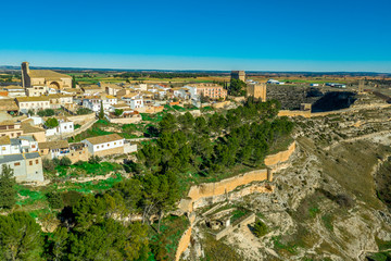 Fototapeta na wymiar Aerial view of Alarcon castle, parador and fortifications along the Jucar river in Cuenca province Spain