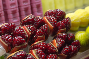 Pomegranate red fruit and ruby juice in a bottle