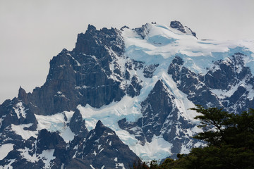 Fototapeta na wymiar Glacier covered Mountain top in Torres del Paine, Chile
