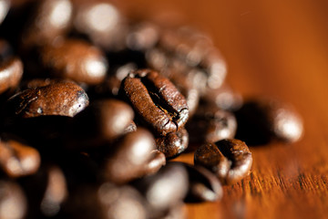 Fototapeta premium coffee beans on wooden background