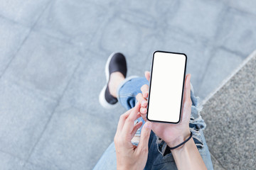 Mockup image blank white screen cell phone.man hand holding texting using mobile.background empty space for advertise text.people contact marketing business,technology 