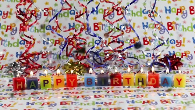 happy birthday with candles and confetti