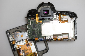 The inside of a broken DSLR camera