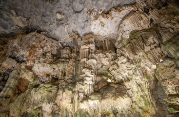 Beautiful flowstone and stalactites in Thien Cung Cave (Heavenly Palace Cave) of Halong Bay, Vietnam. Thien Cung Cave is one of the largest and most beautiful caves in Halong Bay.