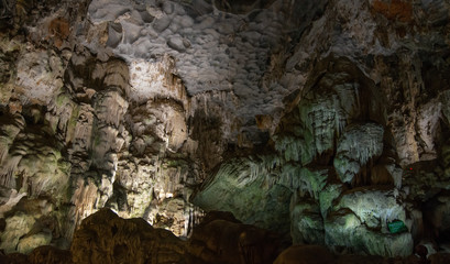 Beautiful flowstone and stalactites in Thien Cung Cave (Heavenly Palace Cave) of Halong Bay, Vietnam. Thien Cung Cave is one of the largest and most beautiful caves in Halong Bay.