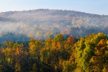 Morning sunrise during fall foliage season, Stowe, Vermont, USA
