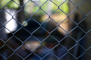 chain link fence with barbed wire