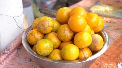 Oranges fruits in the container.