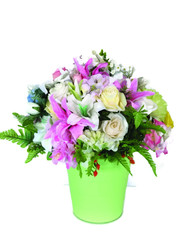Many colorful bouquet of flowers in a green vase on a white background