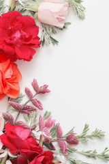 rose flowers and leaves on white background
