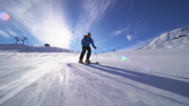 professional skier skiing on slopes in the Swiss alps