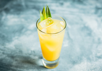 Pineapple cocktail in highball glass. Selective focus. Shallow depth of field.