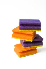 A stack of cleaning sponges isolated on a white background. The concept of cleaning, cleansing and bleaching