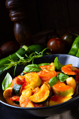 zucchini vegetarian ratatouille with tomato sauce and herbs