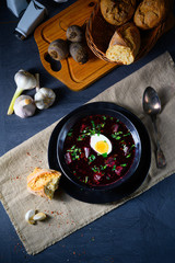Delicious beetroot borscht with egg