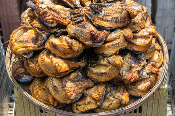 Dried fish rolled up ans stacked in Ang Thong Thailand local market