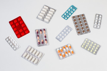 different types and colors of pills in the package
