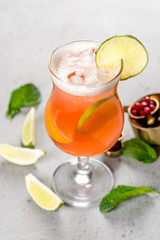 Mint and lime cocktail decorated with mint leaves