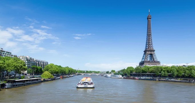 River Seine with the Eiffel Tower in the distance, Paris, France, Europe - Time lapse