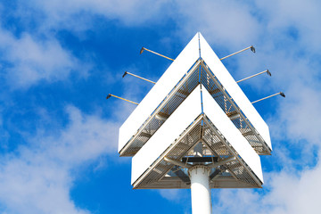 Mock up. Big billboard, blank advertising board, billboard canvas with blue sky background