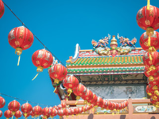 Sky blue Close to the Chinese New Year Asian cultural descent churches and temple Including red lanterns to decorate with Chinese write meaning good luck wealth money throughout the year as a greeting