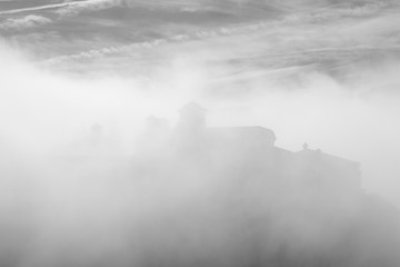 Meteora, Greece - Dec 19, 2019: Foggy landscape of Meteora Monastery , Greece
