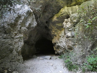 Photo of the entrance to a rocky cavet. This photo was taken in the Luberon in Provence.