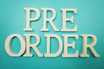 Pre Order alphabet letter on blue background