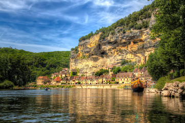 Approaching La Roque Gageac on the River Dordogne, France