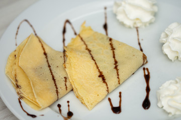 pancakes with whipped cream ,Sweet Crepes with chocolate and Whipped Cream