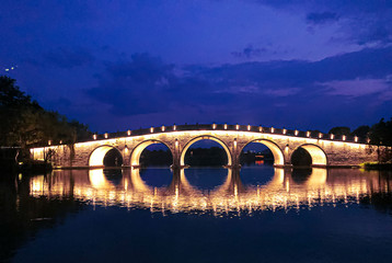 Fototapeta na wymiar bridge over the river in the night