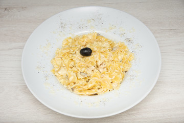 Farfalle pasta with  olive sauce