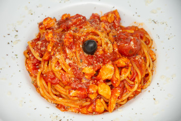 red spaghetti with olives