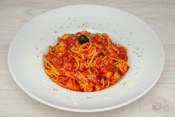 red spaghetti with olives
