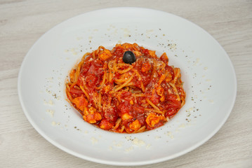 red spaghetti with olives