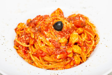 red spaghetti with olives
