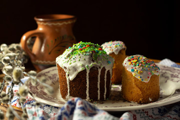 Orthodox traditional easter cakes with icing and sweet decorative colorful drops