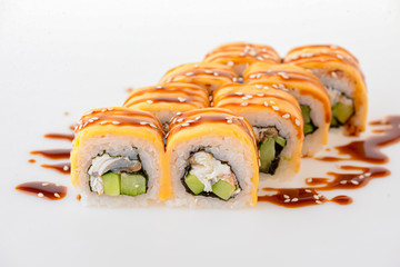 Sushi rolls philadelphia cheese. Smoked salmon, cream cheese, cucumber inside. Set of eight cheese sushi rolls isolated.
