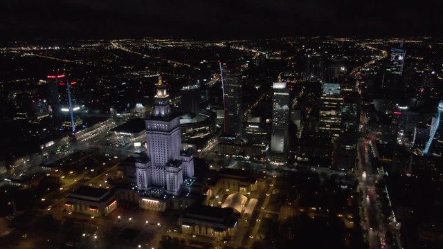 Drone shot of Palace of culture and science in Warsaw surrounded by other business buildings