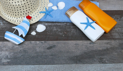 Sun cream with beach accessories