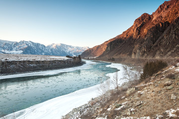 River in the mountains in winter