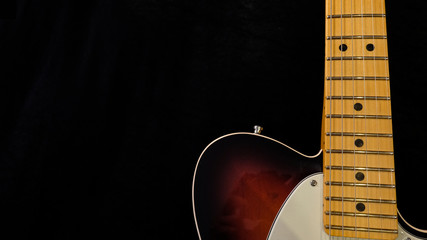close up detail of fingerboard guitar , electric guitar instrument for musician, with selective...