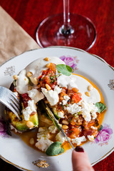 aubergine stuffed with vegetables and cheese